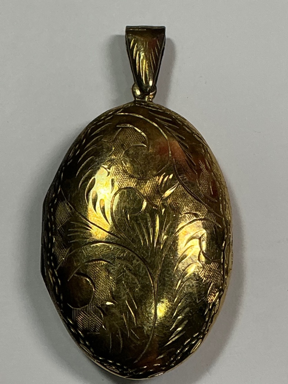 Vintage Sterling Silver Gold Vermeil Oval Shaped Floral Etched Locket. 2.25”